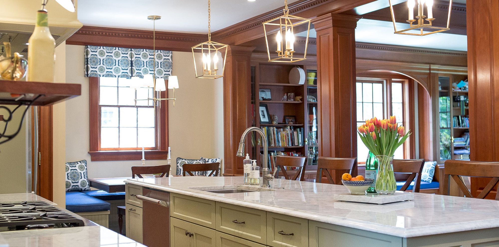 Open concept kitchen with pendant lights